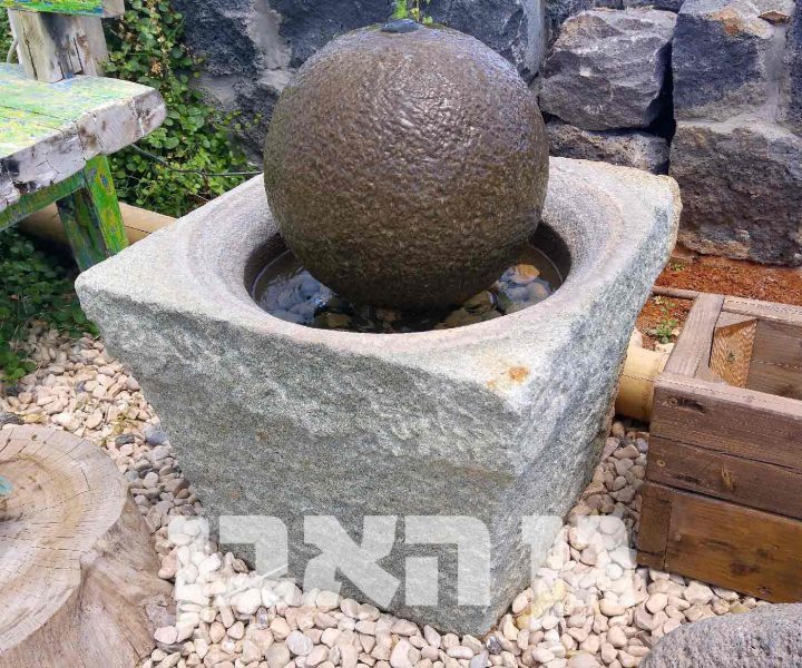 מזרקת ספרת אבן בשוקת עתיקה